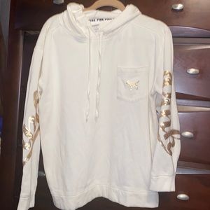 PINK hooded sweatshirt. Cream colored with gold sequin embellishments. Size M
